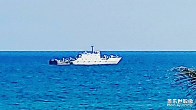 今日的軍艦和三亞國際免稅城