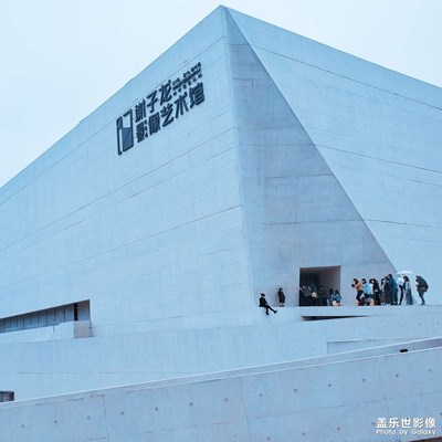 簡